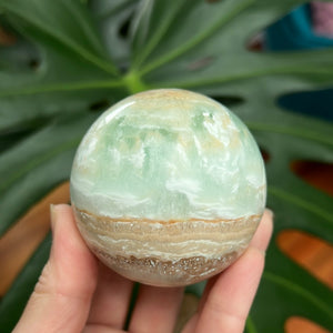 Pistachio calcite sphere
