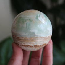 Pistachio calcite sphere